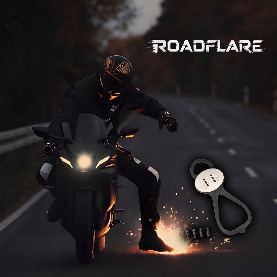 Motorcyclist leaving a spark trail at night